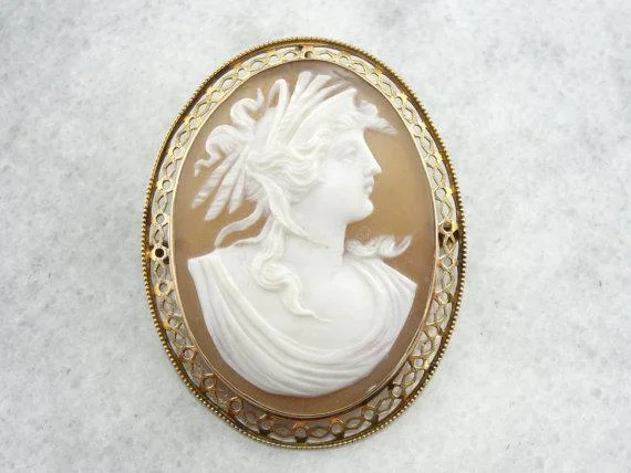 Brooches and pins featuring black onyx for contrast -Vintage Cameo Gold Filigree Brooch