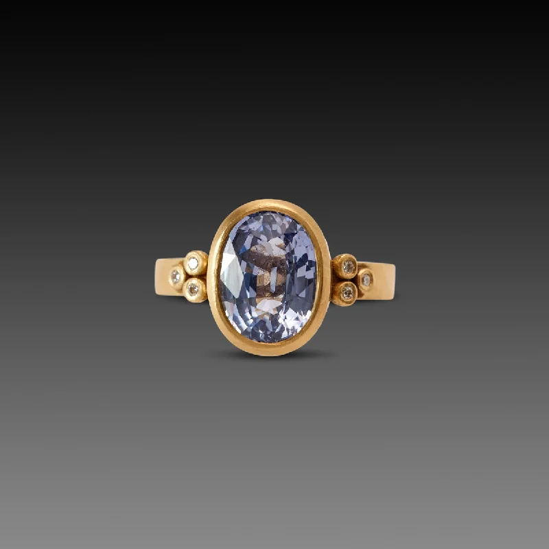 Rings great for occasions with special stones -Oval Sapphire Ring with Diamond Trios