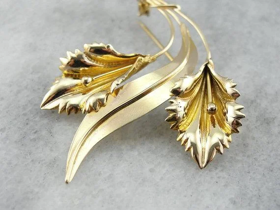 Brooches and pins featuring pearls for classic shine -Sweeping Double Floral Yellow Gold Brooch