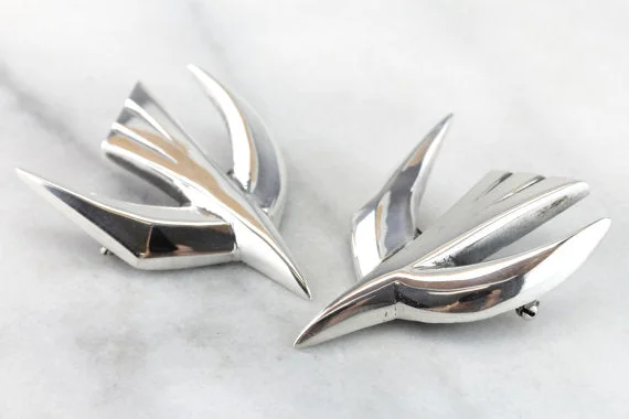 Brooches and pins featuring tourmaline for fall hues -The Dove of Piece; vintage Sterling Silver, Mid Century Brooches by James Avery