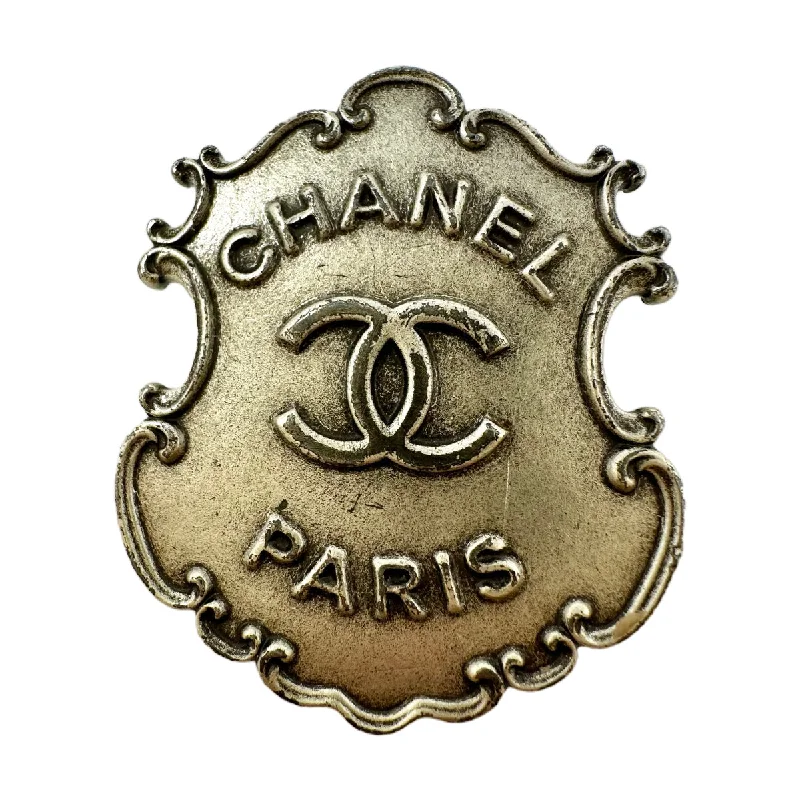 Drop brooches and pins with long stone charms -Chanel Paris Dallas Sheriff Badge Pin